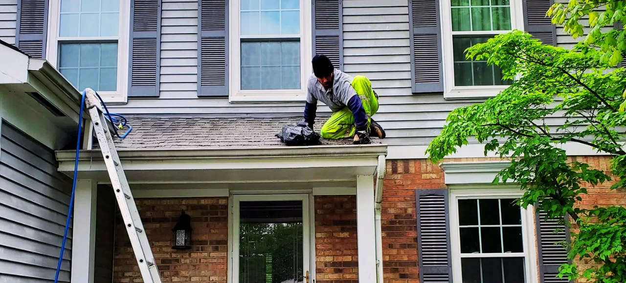 Complete gutter cleaning service including debris removal, downspout cleaning, and flow testing to ensure proper drainage Deck & Patio Cleaning professional-deck-and-patio-pressure-washing-and-power-washing