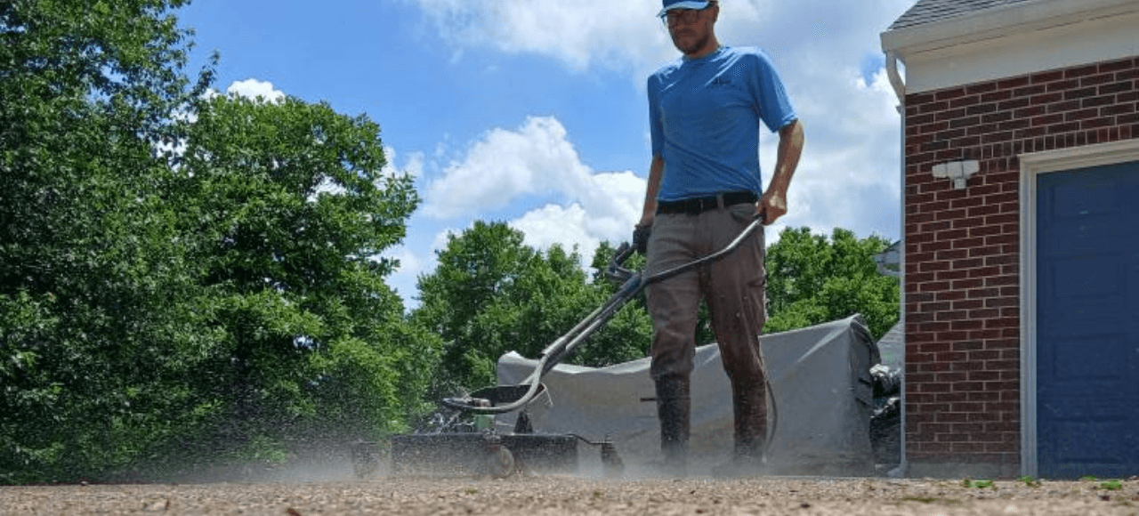 alberts-window-cleaning-technician-pressure-washing-cleaning-conctete-driveway-using-presure-washer